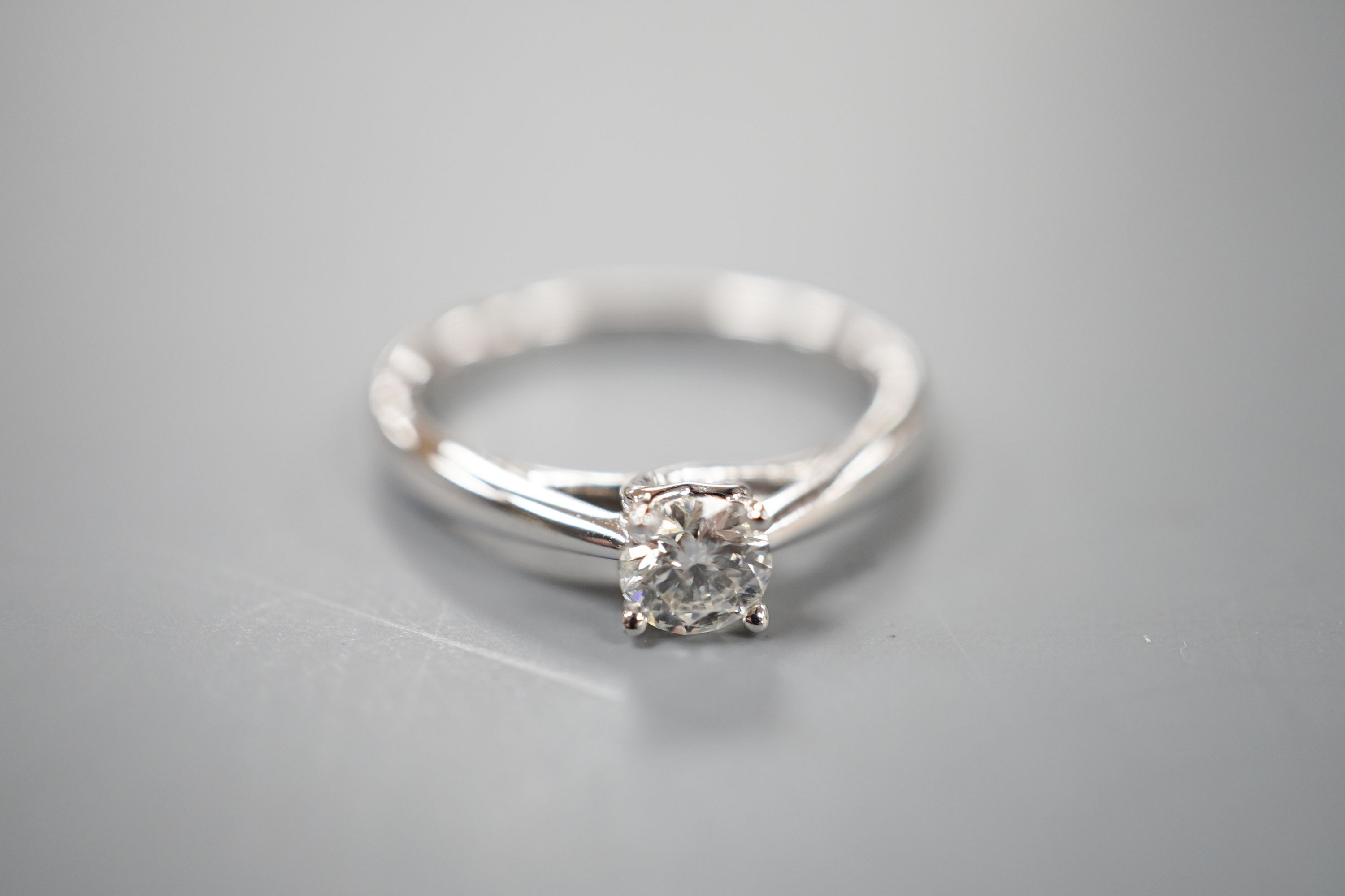 A modern 9k white metal and solitaire diamond ring, the stone weighing 0.33ct, size L, gross weight 2.5 grams.